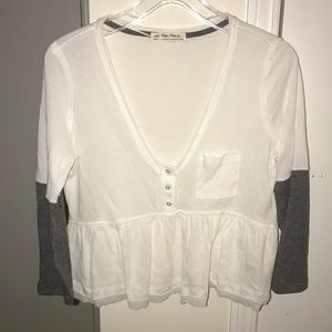 Free people white cropped top.